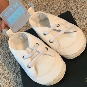 White baby shoes